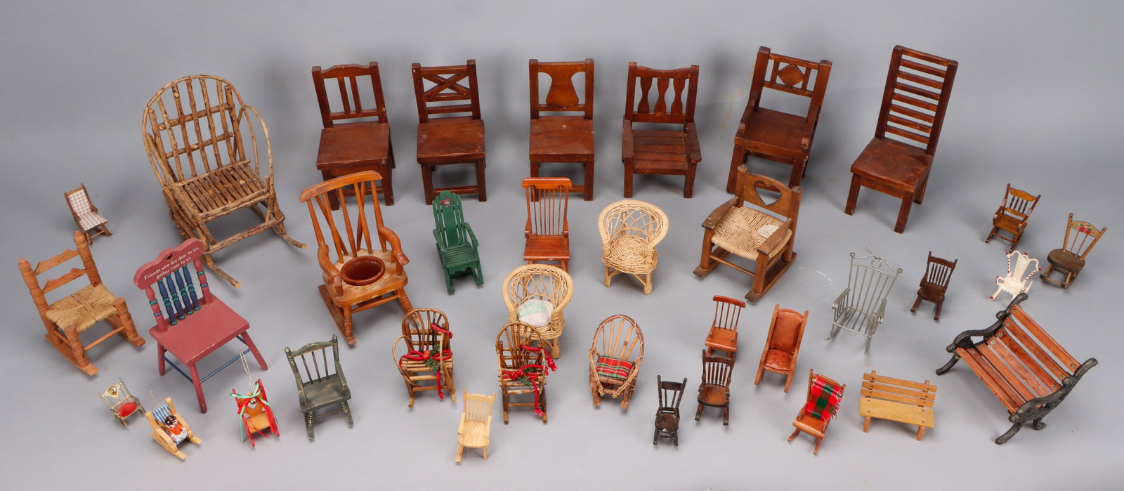 Collector's Lot of Miniature Chairs: Collector's Lot of Miniature Chairs. Including "Churchwarden" furniture by H.J. Berry & Sons, Ltd, Chipping, England. Size: Heights ranging from: 2" (5 cm) to 12" (30 cm).