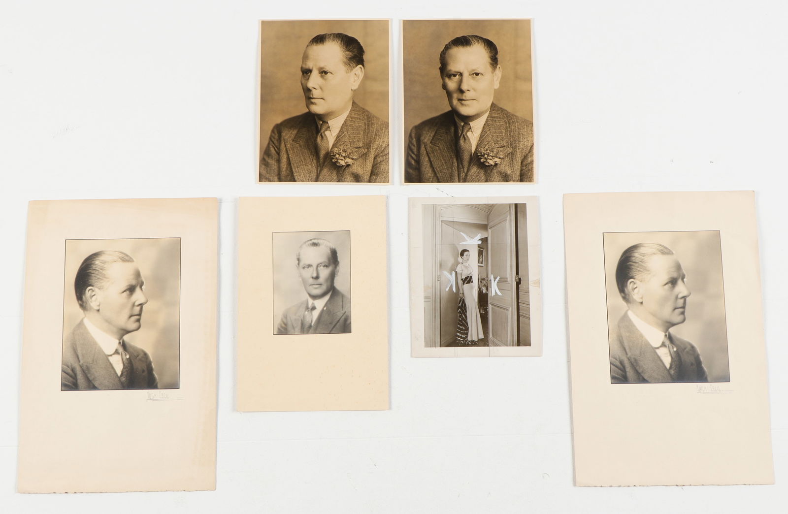 Collector's Lot of Photographs: Wallis Simpson and an Unidentified Gentleman: Collector's Lot of Photographs: Wallis Simpson and an Unidentified Gentleman. Cecil Beaton (English, 1904-1980) Photograph of Wallace Simpson shortly before her wedding in a Mainbocher dress from her