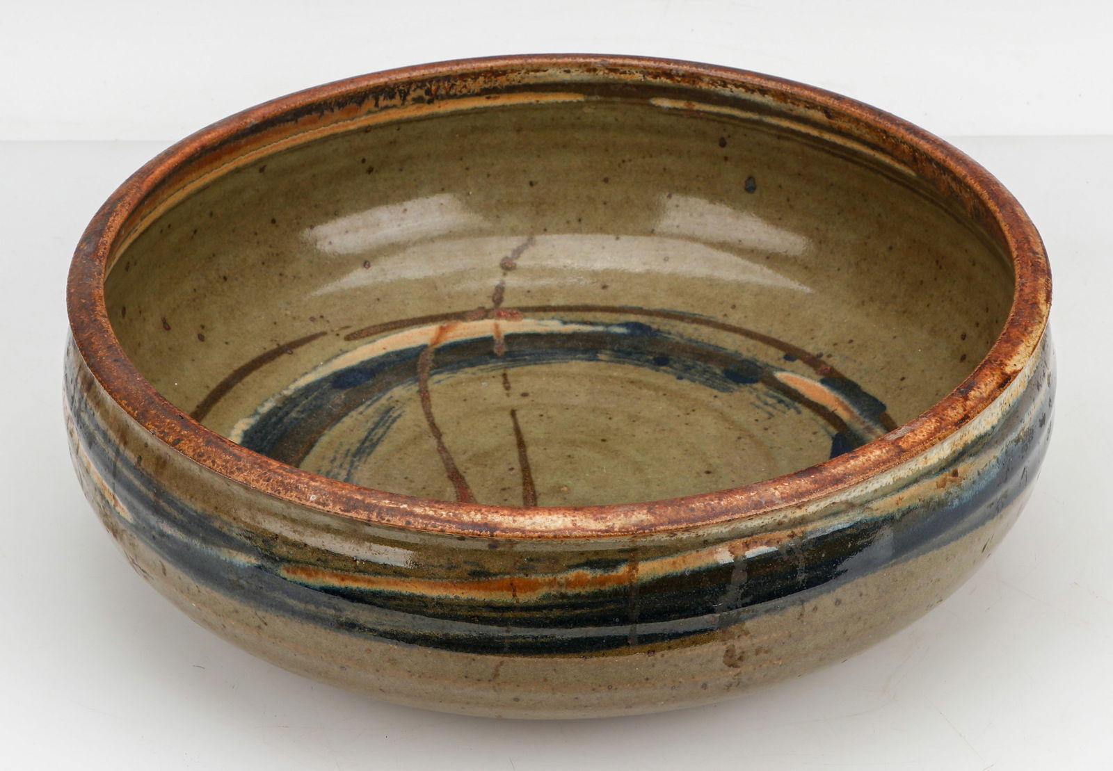 Carl Sande (American, 20th C.) Art Pottery, Signed: Carl Sande (American, 20th C.) Art Pottery, Signed Size: 4.5'' x 14'' x 14'' (11 x 36 x 36 cm). Provenance: The Robert L. Pfannebecker Collection. Artist Biography: Carl Sande was born in Milwaukee an