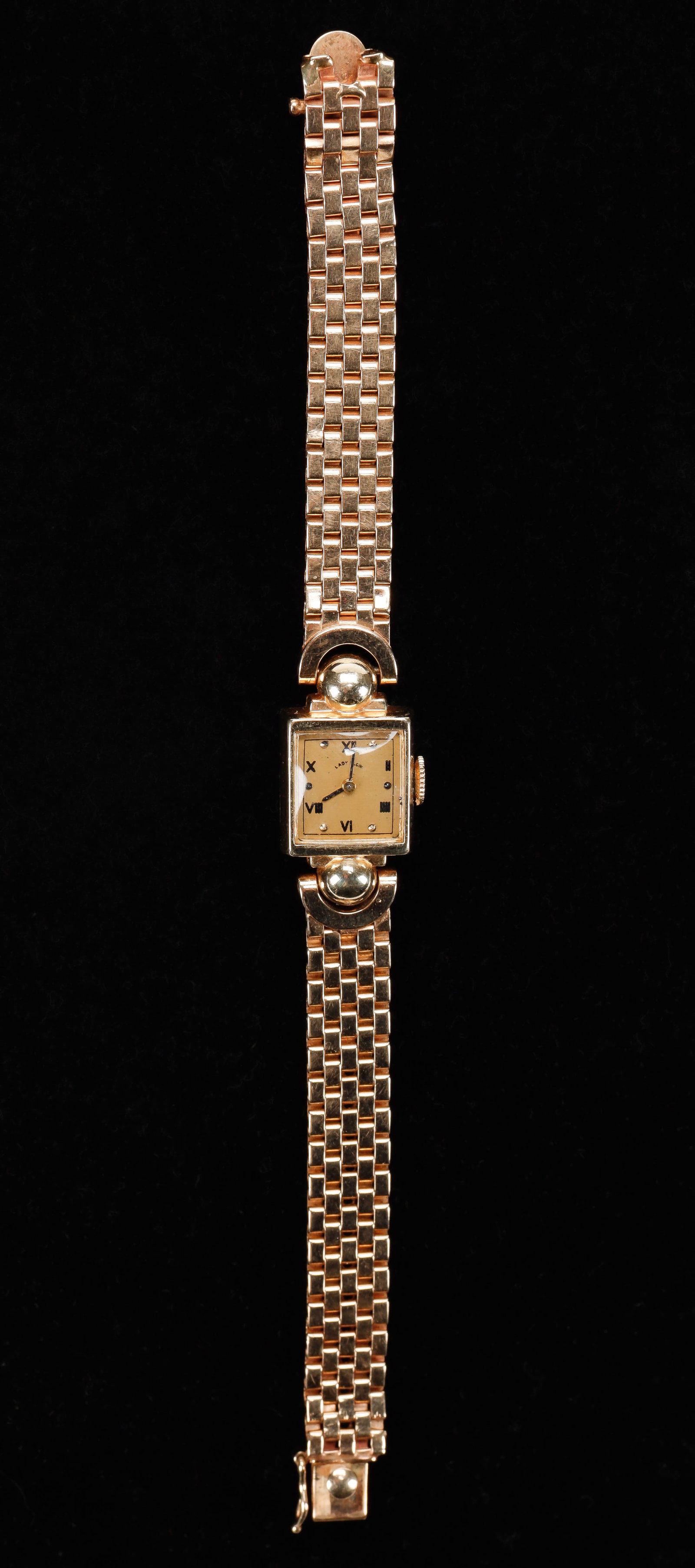 14kt Rose Gold Ladies Watch, C. 1940: 14kt Rose Gold Ladies Watch, C. 1940. Elgin Watch Co. Containing a 19 jeweled mechanical movement by Elgin Watch Co. The dial is also rose color with painted Roman numerals and applied markers. The br