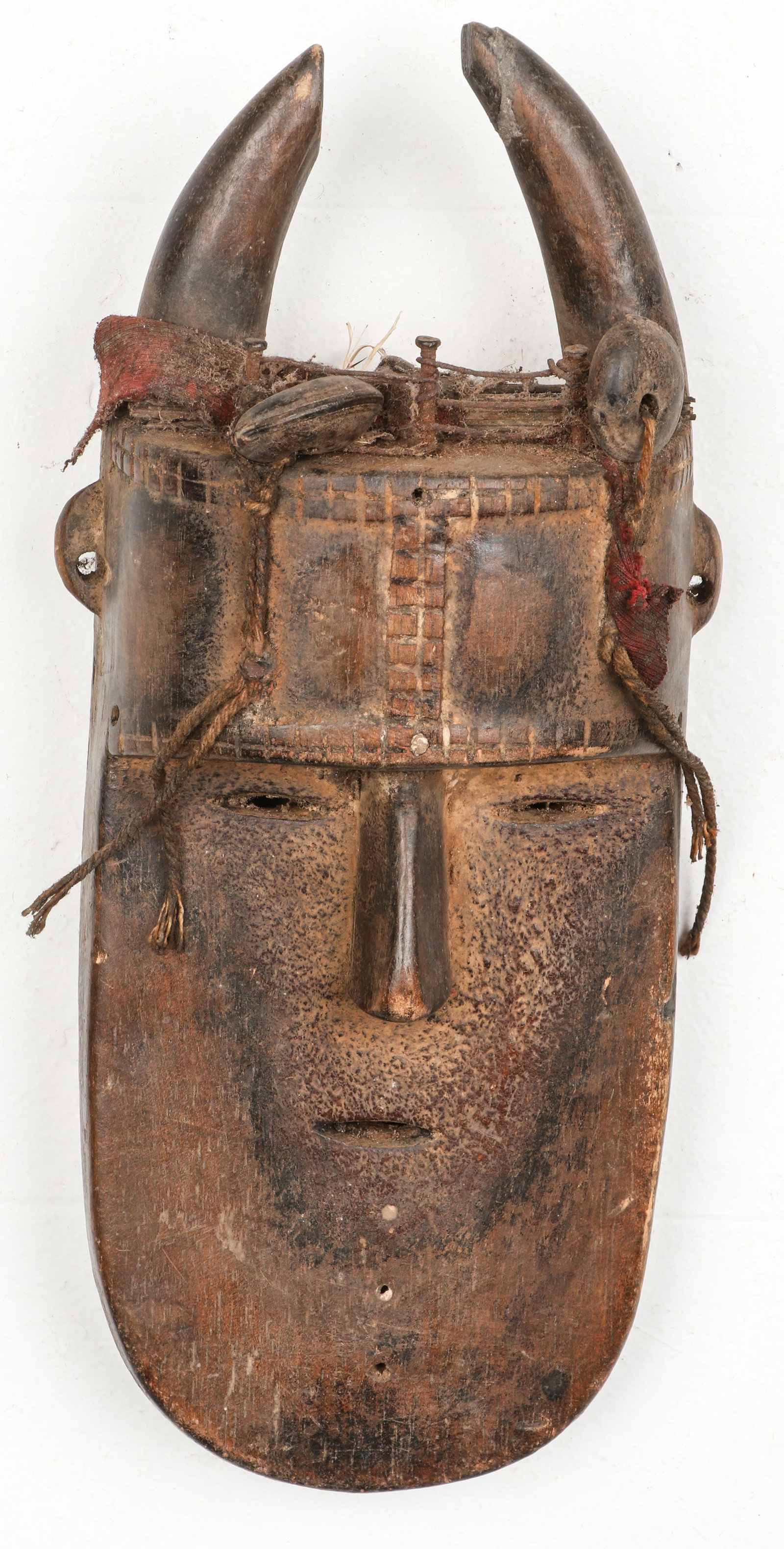 African Fine Old Lomo Mask, Guinea: African Fine Old Lomo Mask, Guinea. Carved wood, patina. Size: 11.5" x 4.5" x 3" (29 x 11 x 8 cm).