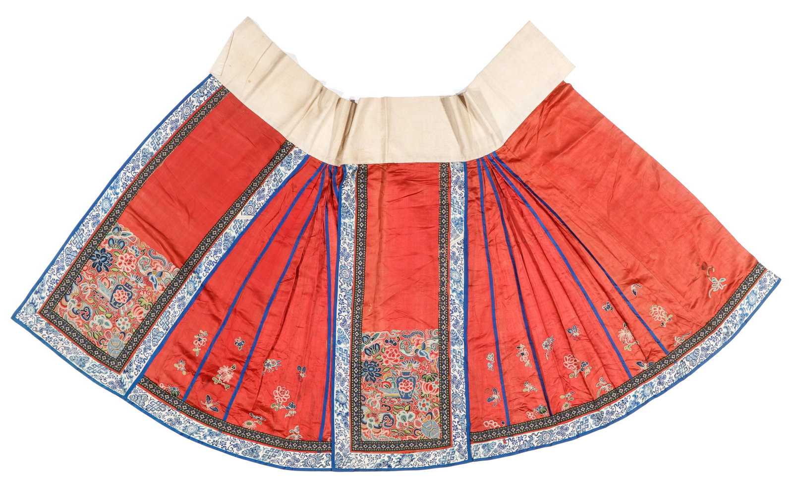 Chinese Embroidered Red Silk Skirt, Qing Dynasty: Chinese Embroidered Red Silk Skirt, Qing Dynasty.A red embroidered skirt adorned with flowers, butterflies, and vases, complemented by blue and white trim. Size: 39'' x 47'' (99 x 119 x cm). Provenanc
