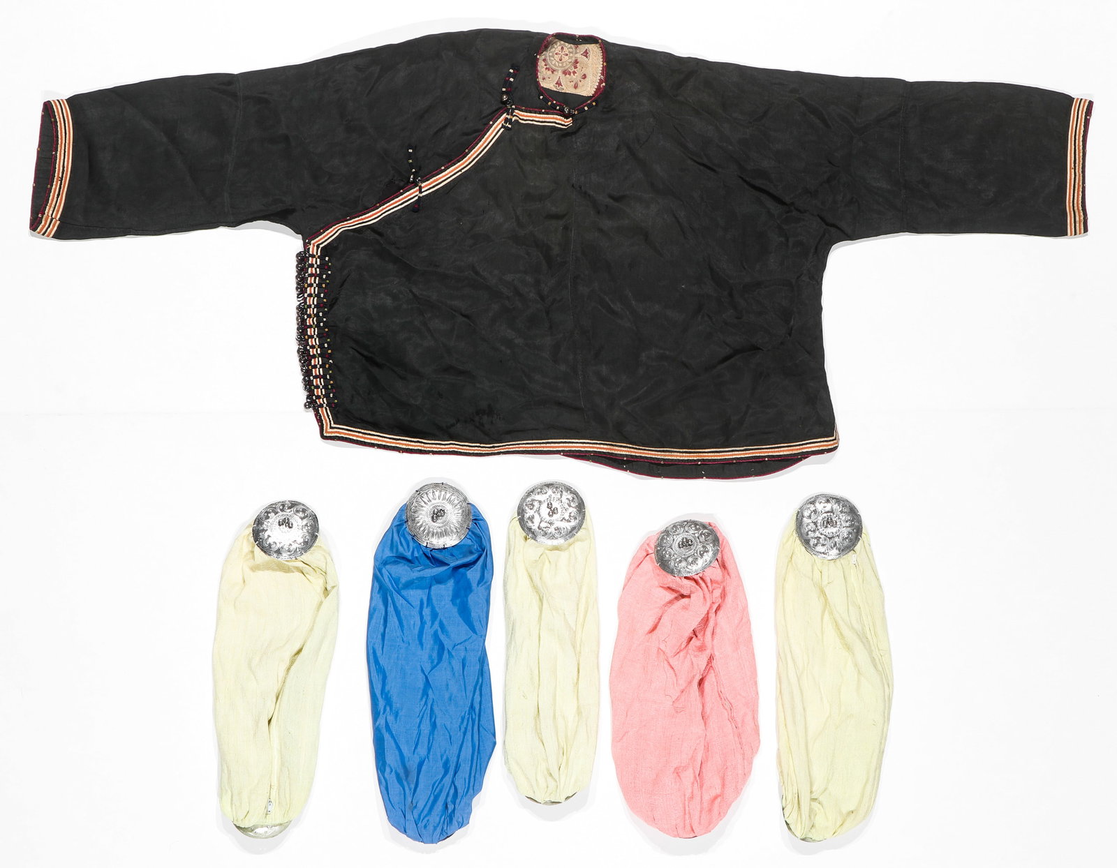 Black Silk Blouse With Bells, 19th C., Thailand and Pillow Cases: Black Silk Blouse With Bells, 19th C., Thailand and Pillow Cases. Sizes: 1) 22'' x 53'' (56 x 135 cm); 2) 3.5'' x 16'' (9 x 41 cm) (each). Provenance: Ex Yosi Barzilai collection.