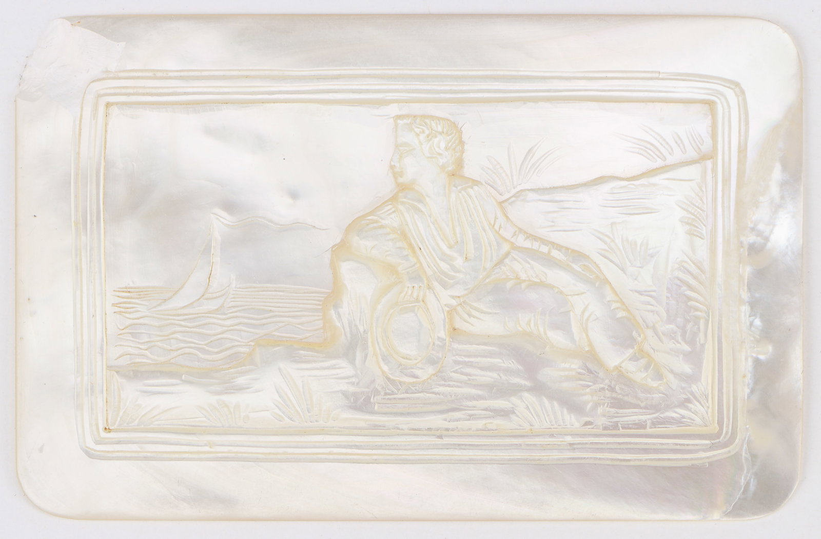 Carved Mother of Pearl Plaque of Man Gazing Out To Sea: Carved Mother of Pearl Plaque of Man Gazing Out To Sea. Size: 2" x 3" (5 x 8 cm). Total Weight: 34.2 g. Provenance: The Silver Shop of Princeton, NJ (1937-2014) formerly located at 59 Palmer Square We