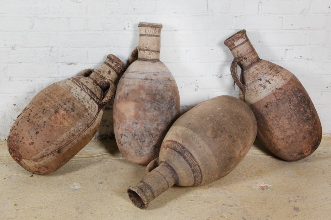 Group of 4 Antique North African Ceramic Urns: Group of 4 Antique North African Urns, round bottoms, used as props for the M. Night Shyamalan movie The Last Airbender (Paramount Pictures). Ranging in Size from 25-1/2 x 10-1/2 (diameter) to 25-1/4 