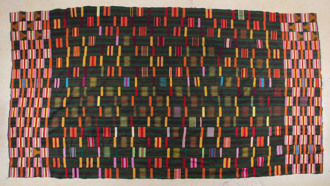 Large West African Kente or Ewe Cloth: Large West African Kente or Ewe Cloth, early 20th c, narrow strips of handspun cotton. Size: 138-1/2 x 71 inches.