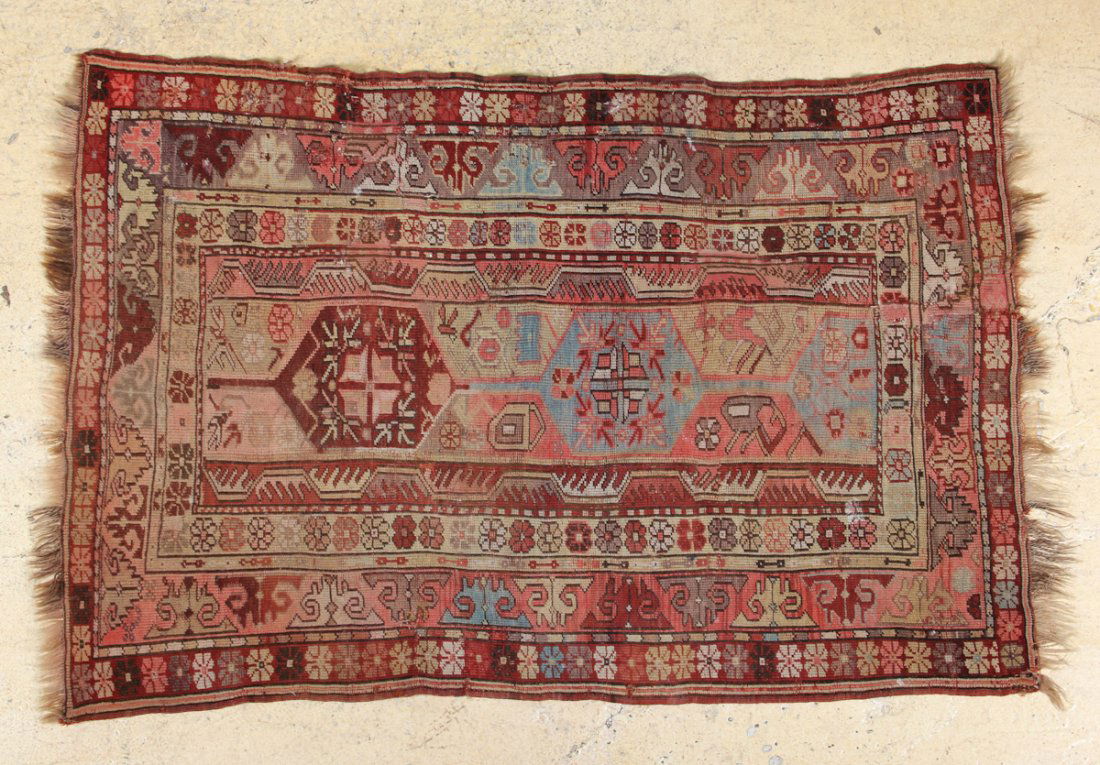 Antique Turkish Milas Rug: Turkish Milas Rug, late 19th c, old repairs, worn, frayed ends. Size: 41 x 62-1/2 inches.