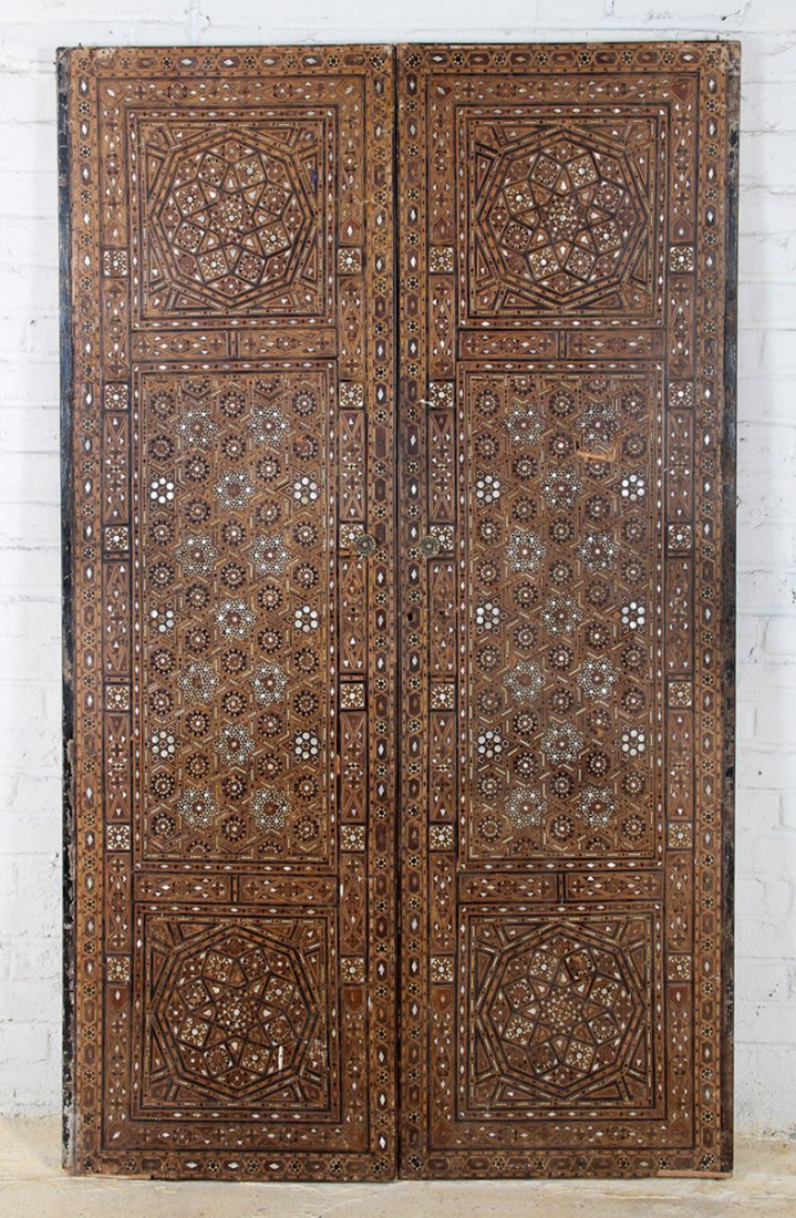 Pair of Syrian Mother of Pearl Cabinet Doors: Pair of Syrian Mother of Pearl Cabinet Doors, circa 1900. Dimensions: 70 x 22 x 1-1/2 inches (each).