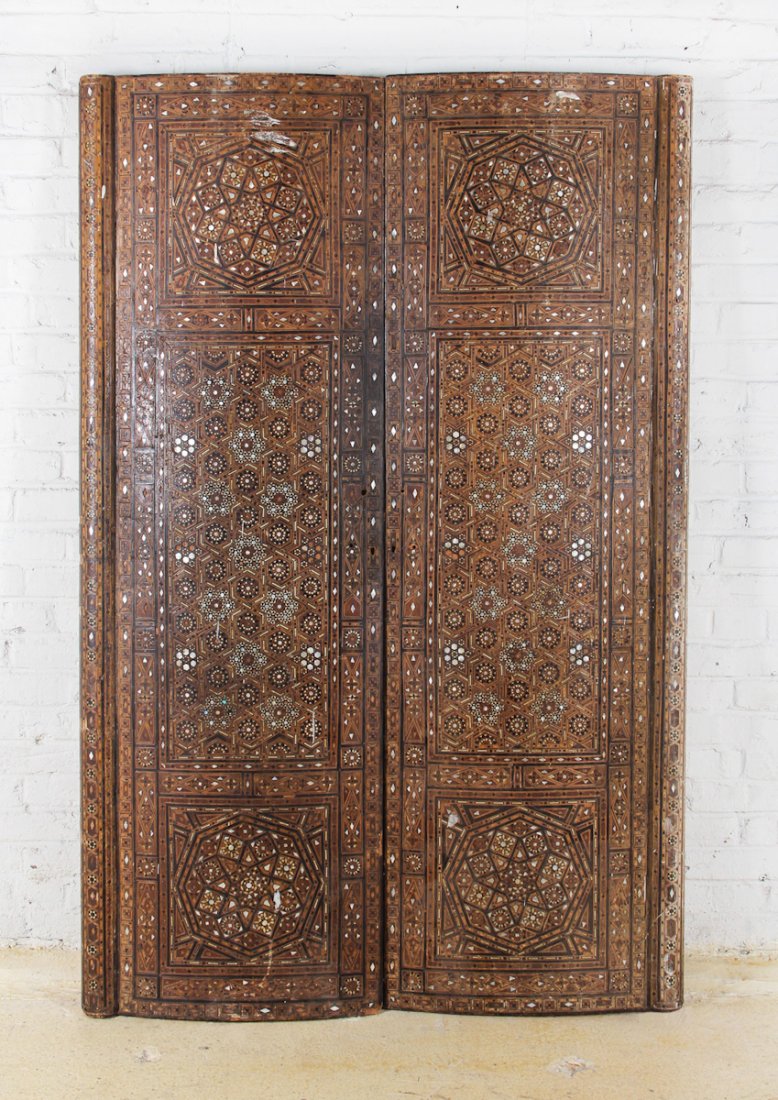 Pair of Syrian Mother of Pearl Curved Cabinet Doors: Pair of Syrian Mother of Pearl Curved Cabinet Doors, circa 1900. Dimension: 70 x 23 x 3 inches (each).