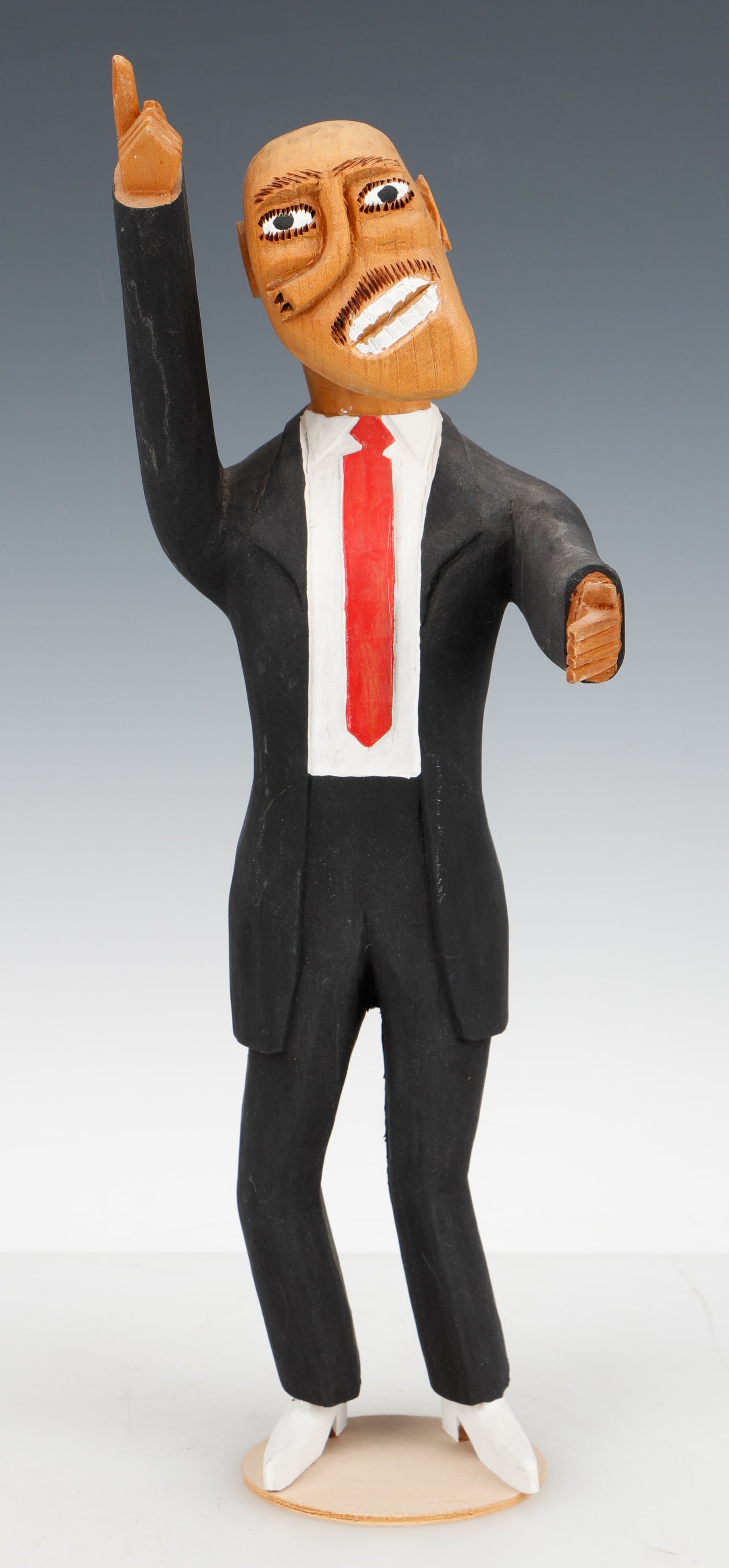 Sulton Rogers (American, 1922-2003) Preacher: Sulton Rogers (American, 1922-2003) Preacher, carved and painted wood sculpture. Size: 13.5'' x 4.5'' x 6'' (34 x 11 x 15 cm).