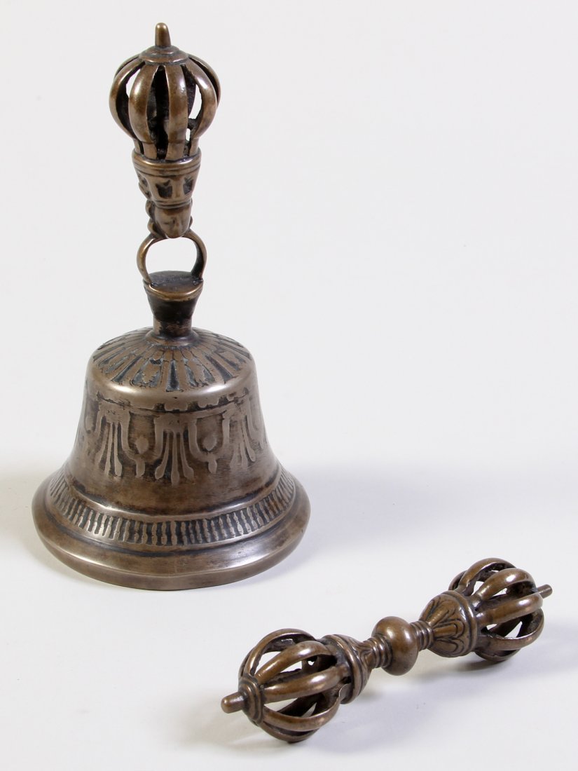 15th - 17th C. Tibetan Buddhist Ritual Set: Buddhist Ritual Set of Vajra and Ghanta/ Dorje and Drilbu - Bronze and 7 metal alloy. Tibet, 15th-17th c. Provenance: Bill Liske. Size: 6.5 x 3.5 x 3.5 inches (bell); 3/4 x 4-3/4 inches.