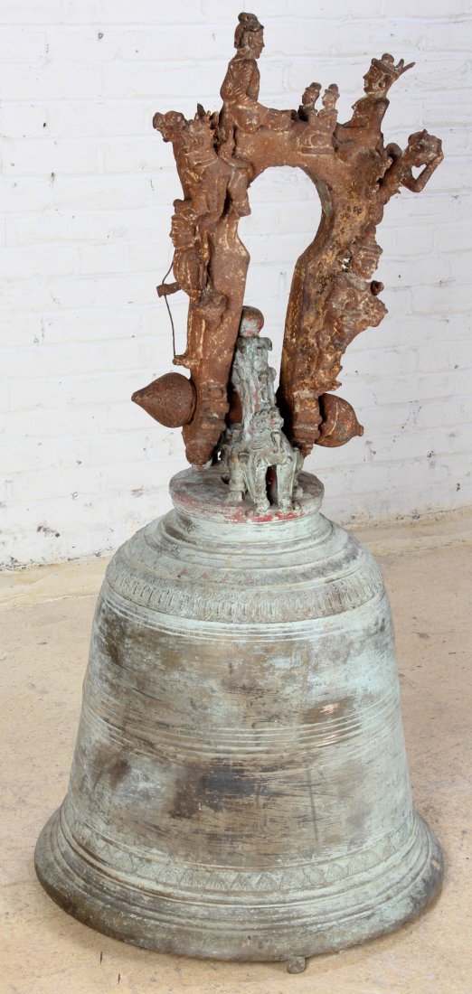 Massive Bronze Buddhist Temple Bell: Massive Bronze Buddhist Temple Bell, Burma, 19th c or earlier, patina, with a tall holding ring with legendary figures from Burmese Buddhist iconographyâ€”kinnari, half man/half bird creatures, a