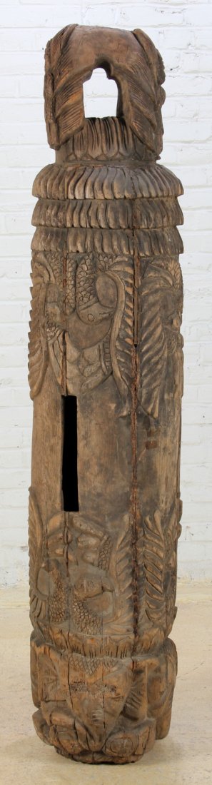 Large Buddhist Temple Bell: Large Buddhist Temple Bell, Burma, pre 1900, carved wood, incised and raised patterns. Size: 74 x 18 x 18 inches (187.96 x 45.72 x 45.72 cm).