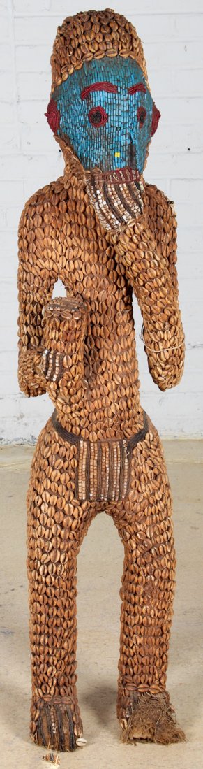Bamun Statue: Bamun Statue, Cameroon, early to mid 20th c, carved wood, cowrie shells, glass beads, purchased old in the 1960's. Size: 55 x 12.5 x 11 inches (139.7 x 31.75 x 31.75 cm).