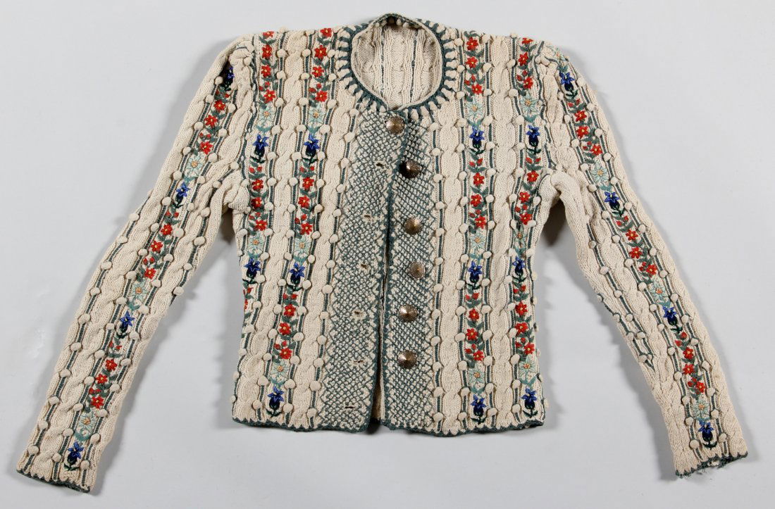 19th C Austrian Woman's Sweater: 19th C Austrian Woman's Sweater, wool knit, silver buttons, natural dyes. Length of Sweater: 19-1/2", Width of Sweater: 13", Length of Sleeve: 21" (each).