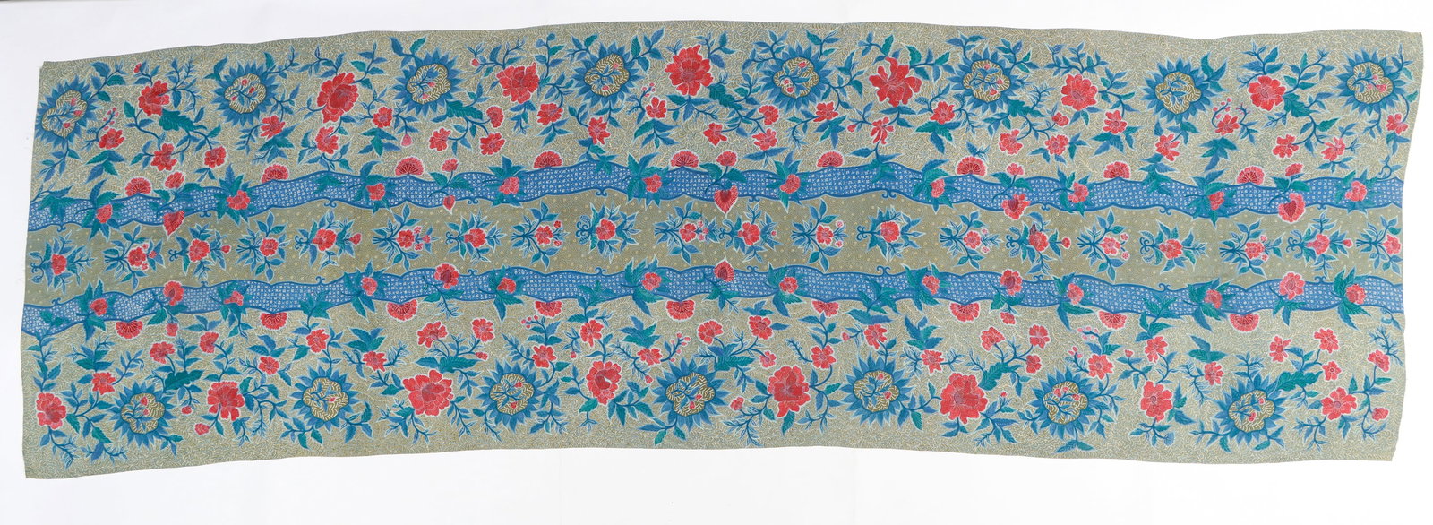 Vintage Bahan Tulis Batik, Indonesia, 11'10'' x 3'8'': Vintage Bahan Tulis Batik, Indonesia. Woman's skirt with center stripes of indigo, in wave formations, surrounded by a vibrant floral motif. Size: 11'10'' x 3'8'' (361 x 112 cm). Provenance: Abigail A