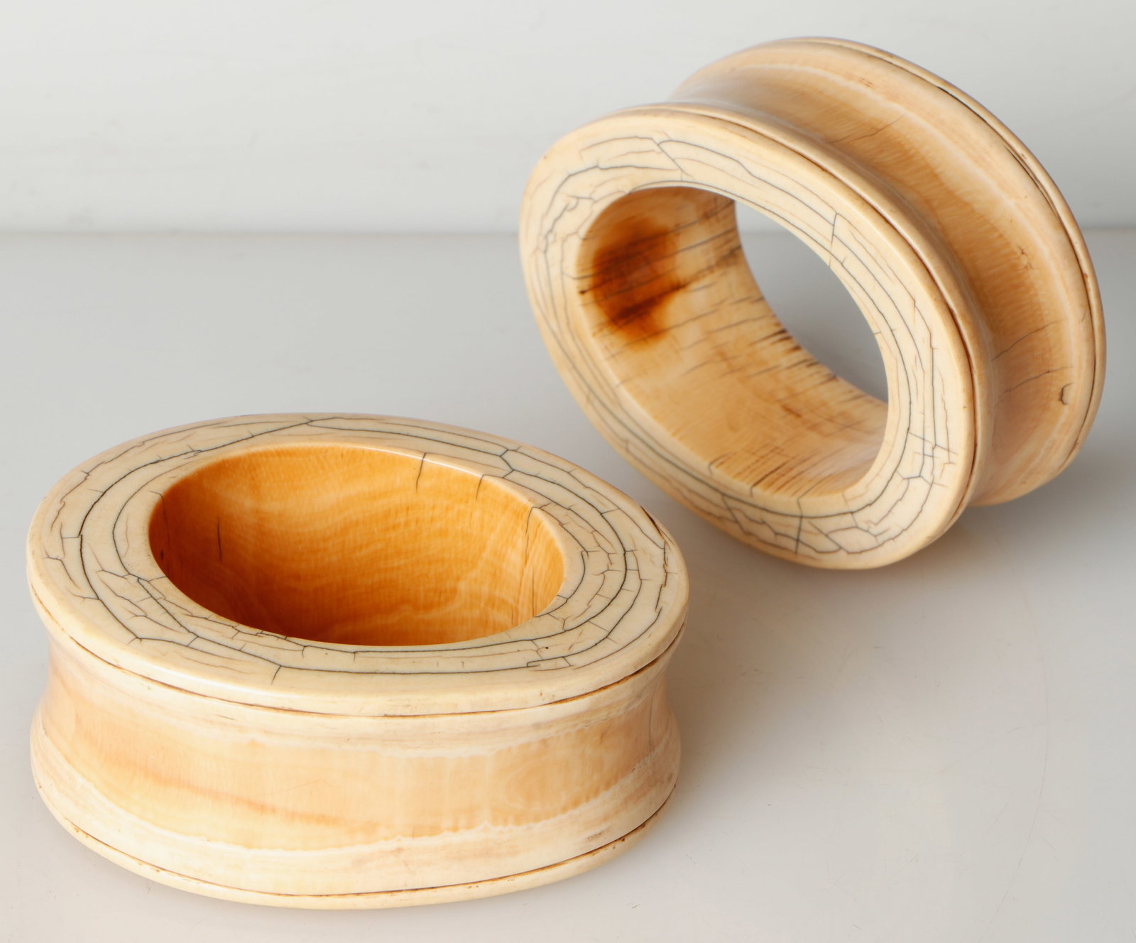 2 Antique African Bone Bracelets: 2 Antique African Bone Bracelets. Size: 2.5'' x 5'' x 4'' (6 x 13 x 10 cm).
