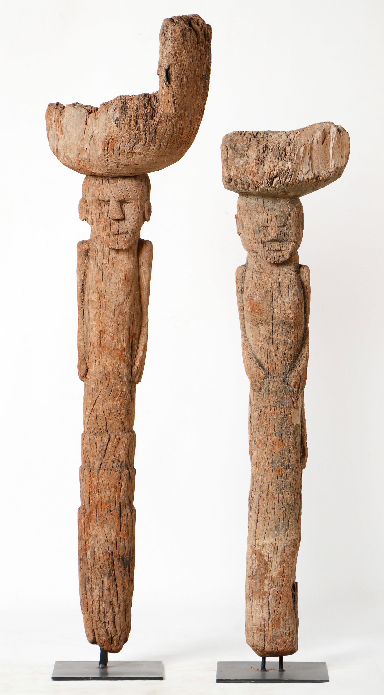2 Karaboro Ritual Vessel Supports, Burkina Faso, Published.: 2 Karaboro Ritual Vessel Supports, Southwestern Burkina Faso, Cascades Region, Comoé Province. On stands. Wood. Height: 4'11" (150 cm). Height: 4'1" (124 cm). TW0337 & 0336. Right hand post is publis