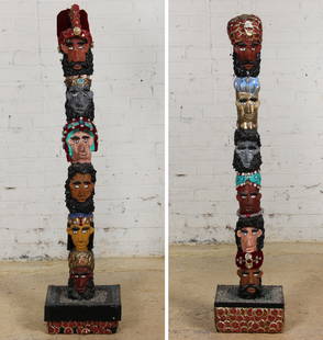 016: Mr. Imagination (American, 1948-2012): Two Totem S: Mr. Imagination (American, 1948-2012): Two Totem Sculptures, each with six stacked heads, mixed media. Sizes: 46.5 x 10.25 x 9 inches and 49 x 11.5 x 10.25 inches.