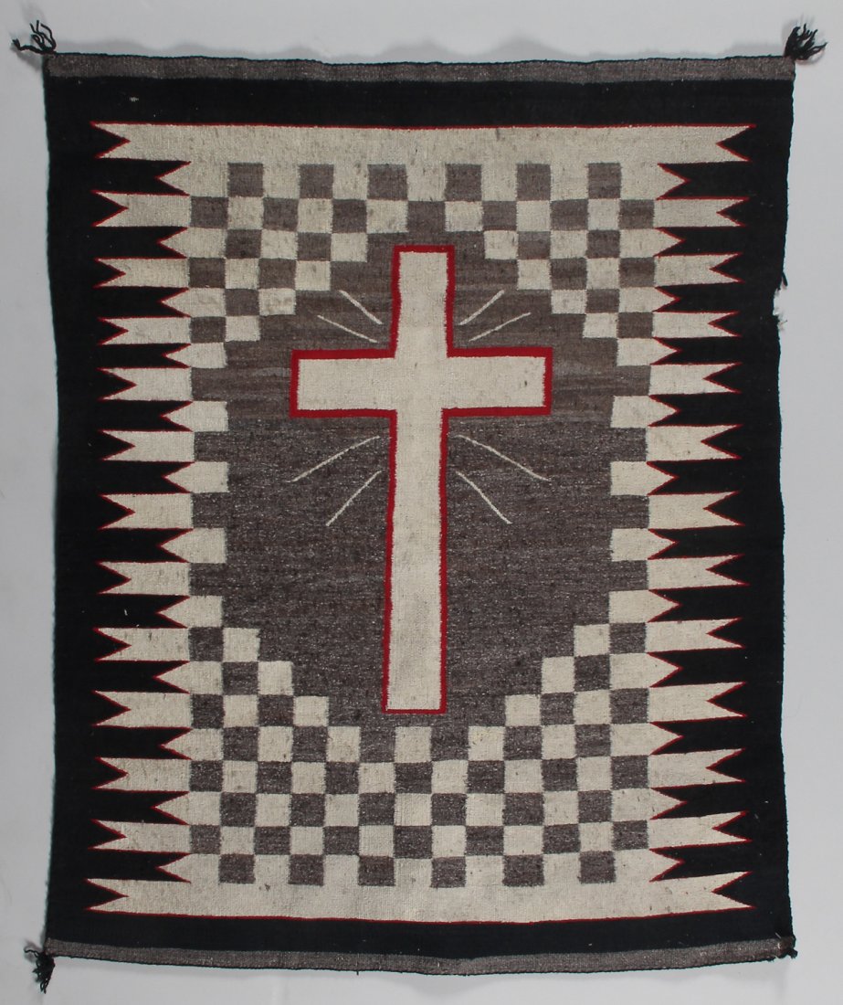 Navajo Rug: Navajo rug, early 20th C, depicting a Christian cross. Property of The Grace of God, The Church of Deliverance, Philadelphia. Size: 3' 1" x 3' 10" (93.97 x 116.84 cm).