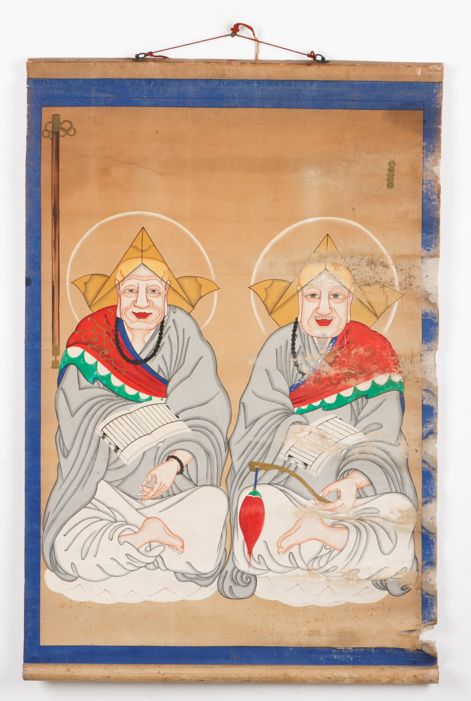 Tibetan Thangka of 2 Monks: Tibetan Thangka of 2 Monks. Pigments on cloth on paper. Water damage, mildew. Size: 35'' x 25'', 89 x 64 cm (without borders); 38'' x 27'', 97 x 69 cm (with border).