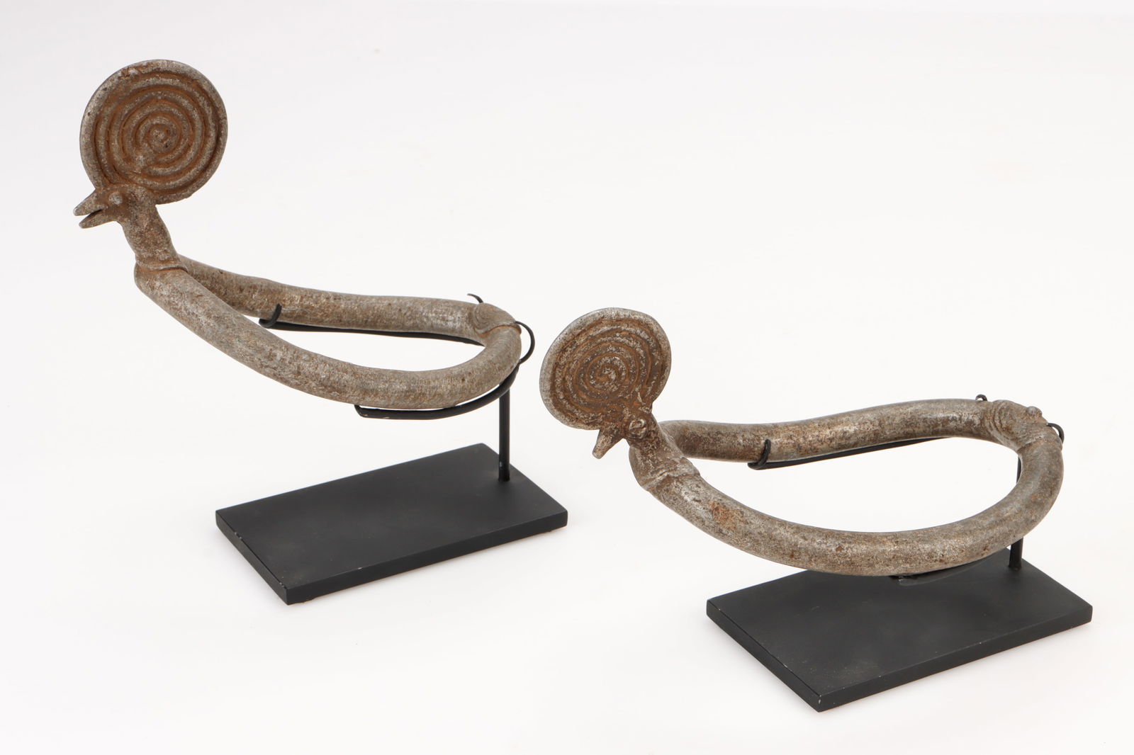 2 Bwa Aluminum Anklets, Burkina Faso: 2 Bwa Aluminum Anklets, Burkina Faso. On stands. Each length: 7" (18 cm). Provenance: Thomas G. B. Wheelock Collection, New York.