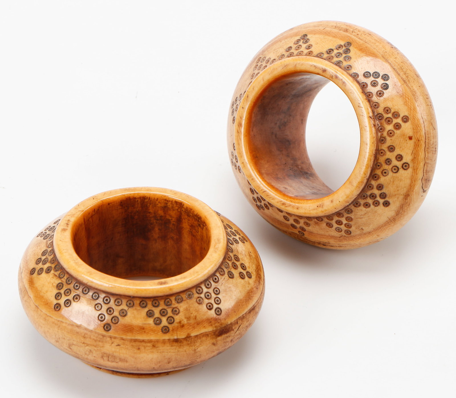 2 Antique African Bone Bracelets: 2 Antique African Bone Bracelets. Each Size: 4'' x 3.75'' x 2'' (10 x 10 x 5 cm).