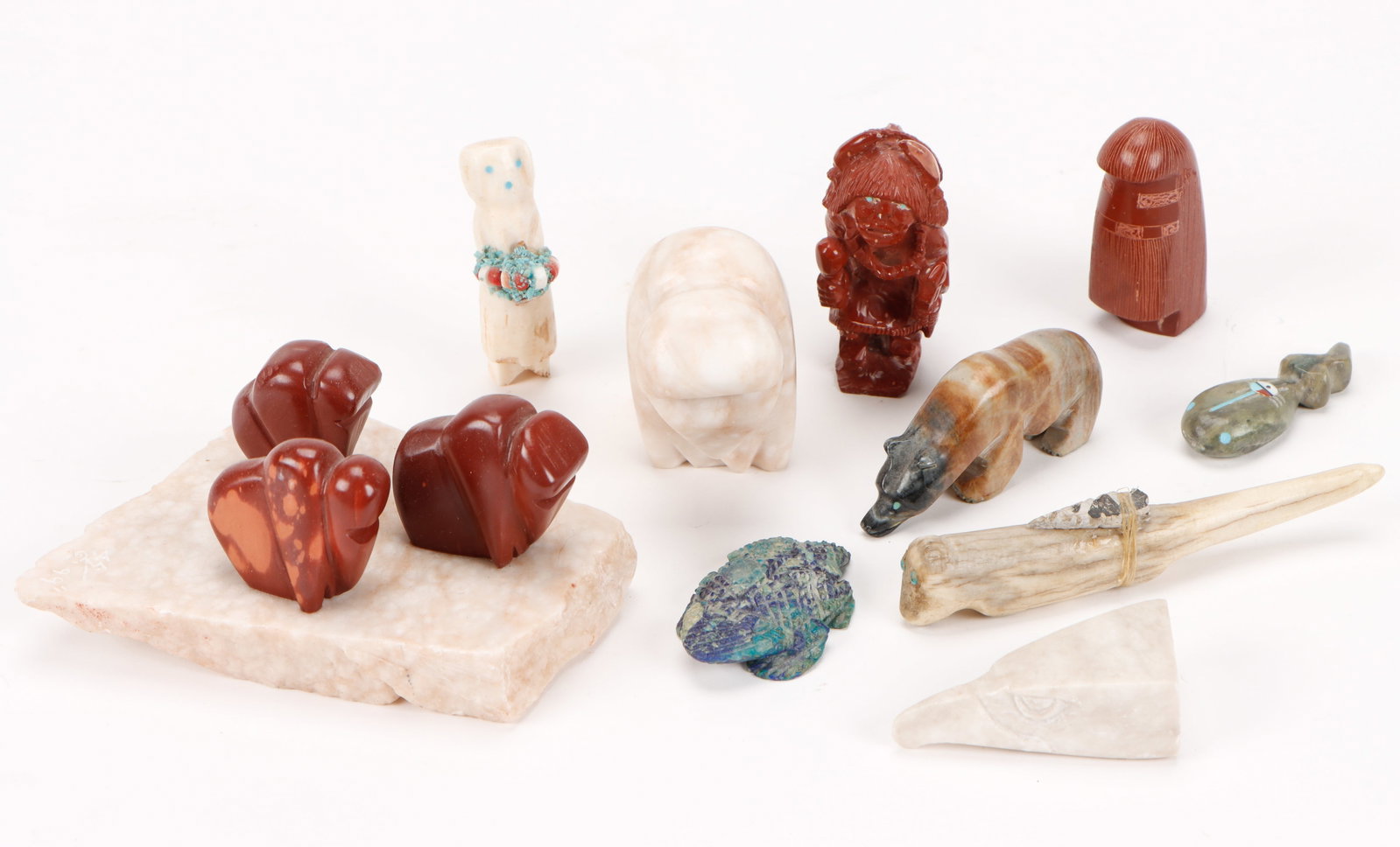 Group of 10 Native American Zuni Fetishes: Group of 10 Native American Zuni Fetishes. Bone, azurite, shell, turquoise, stone. including works by Marvalita Phillip, Todd Poncho, Derrick Kumasee and other unknown artists. Size: length from 2''(5