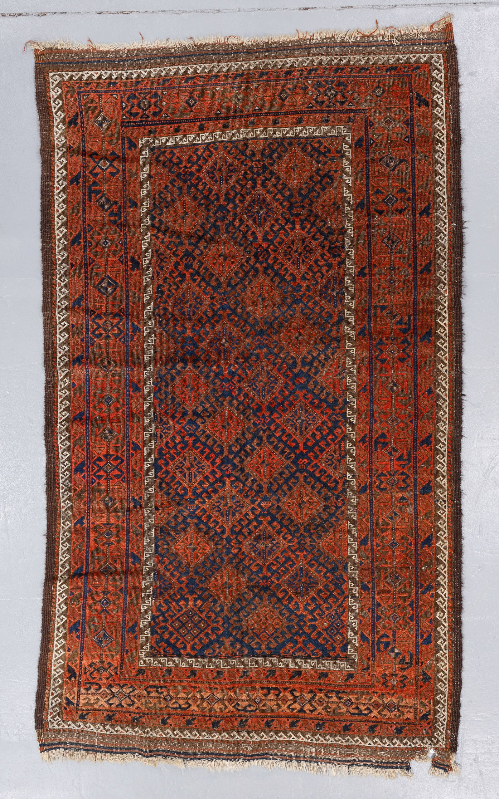 Baluch Rug, Khorasan Area, Persia, Ca. 1875, 4'0'' x 6'8'': Baluch Rug, Khorasan Area, Persia, Ca. 1875, 4'0'' x 6'8'' (122 x 203 cm). Weight: 8 lbs. Material: wool pile, wool warp, wool weft. Very unusual main border, and uncommon inner minor white border. Ex