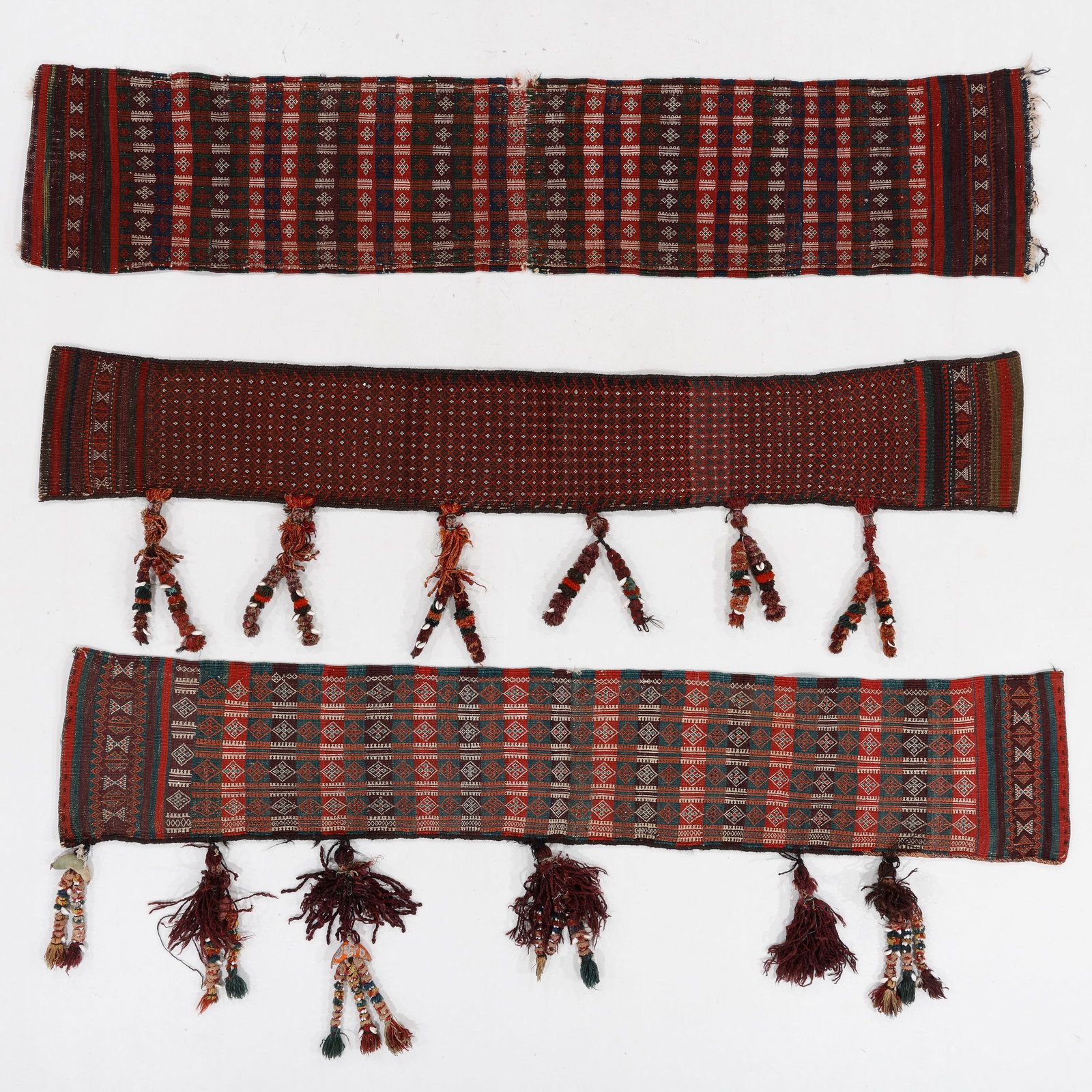 3 Baluch Flatwoven Covers, Baluchistan, Ca. 1900: 3 Baluch Flatwoven Covers, Baluchistan, Ca. 1900. These long narrow flatweaves are called jam dan or das dan, and were used to cover piles of bedding, and/or folded and sewn into bags or pillows. Larg