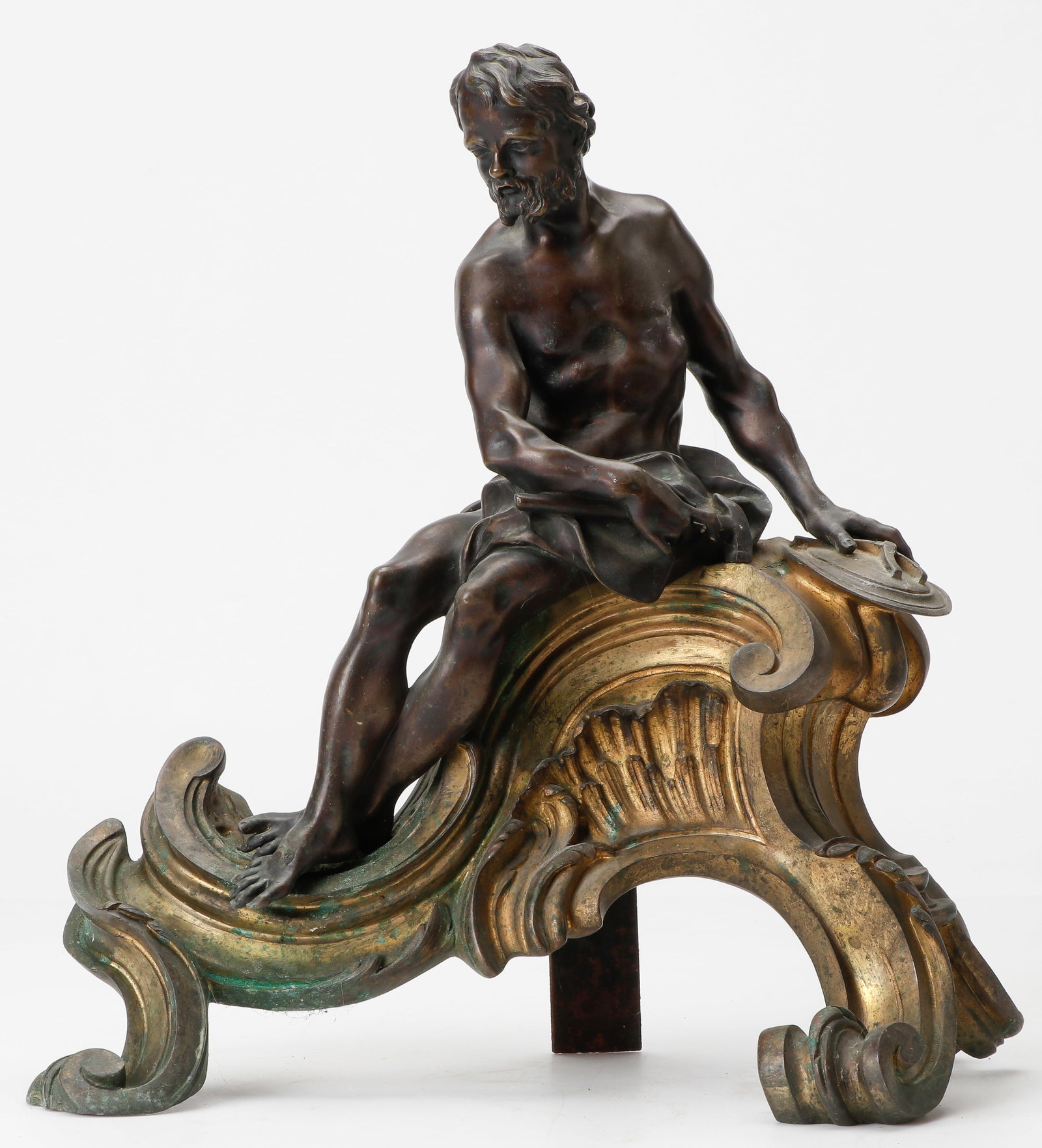 Antique French Bronze Chenet With Hephaestus, Early/Mid 19th C.: Antique French Bronze Chenet With A Figure of Hephaestus, Early/Mid 19th C. Patinated bronze Hephaestos (Vulcan) God of fire and forge shown with his smithing tools and seated on a gilt bronze rocaill