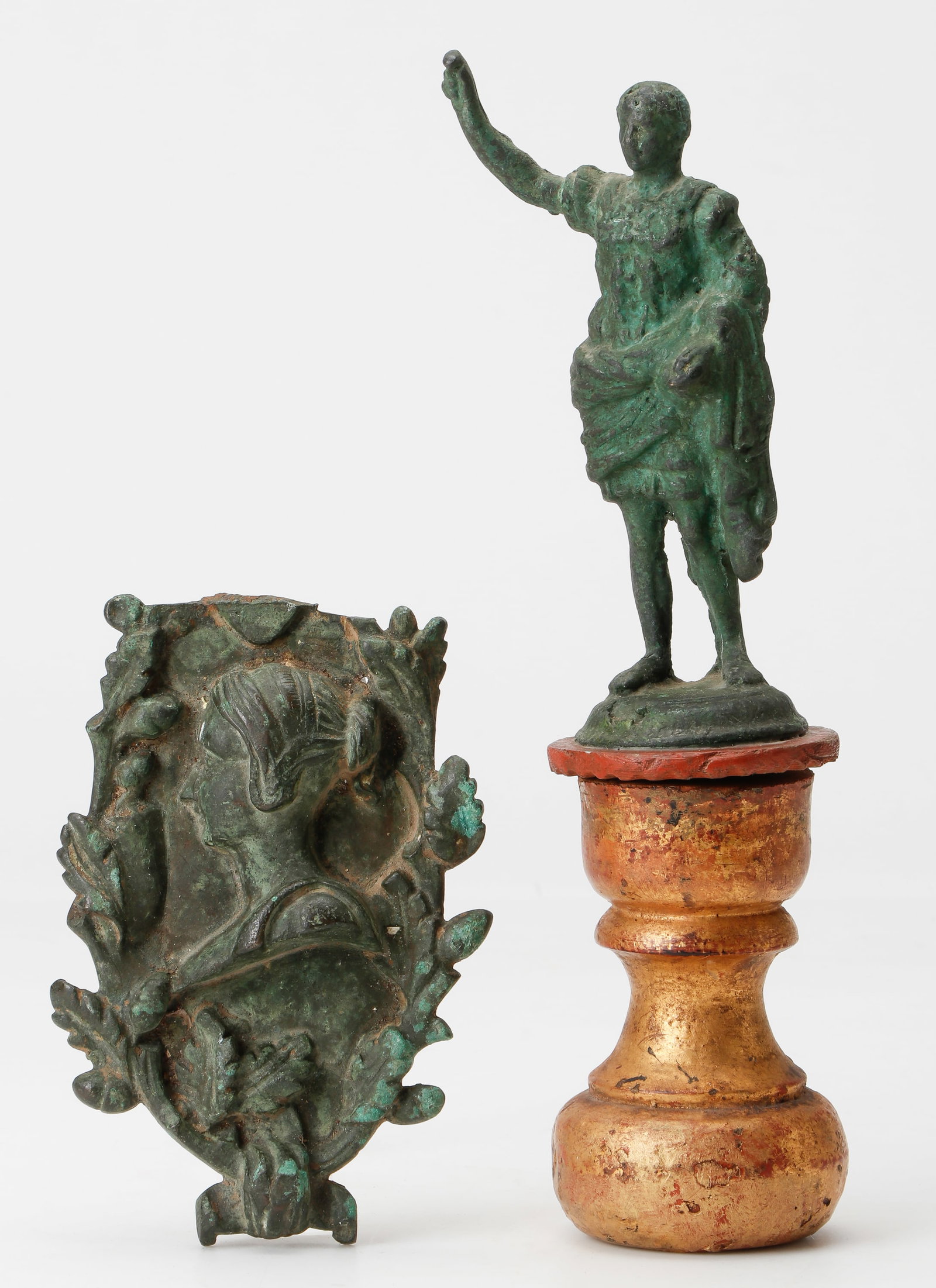 2 Antique Grand Tour Bronzes: 2 Antique Grand Tour Bronzes. Including: a diminutive bronze figure of Augustus Primaporta on a pedestal. Height: 6.75 (17 cm); Height on stand: 11.5" (29 cm). Together with a plaque depicting a femal