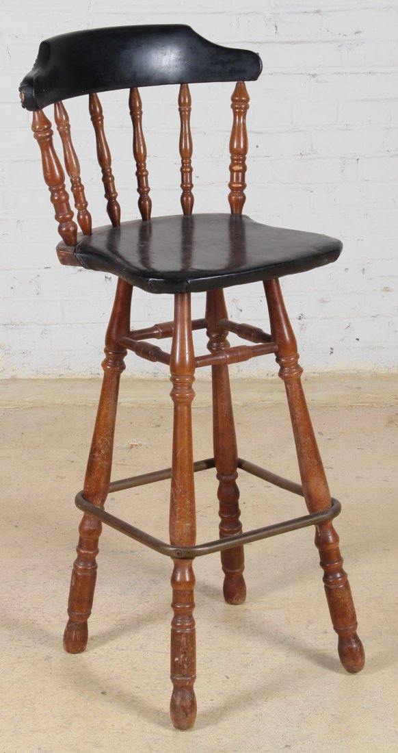 Black and Brown Leather Vintage Barstool: Black and Brown Leather Barstool. Size: 44 x 20.5 x 17 inches.