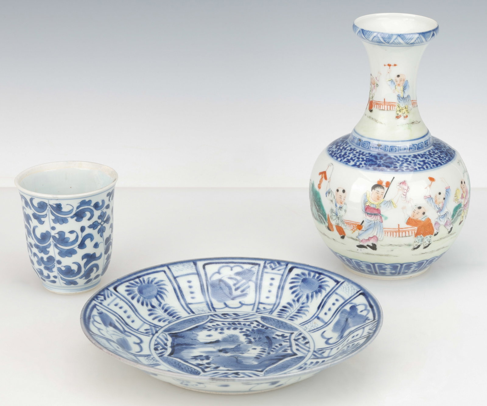 Antique Chinese Porcelain Collector's Lot: Antique Chinese Porcelain Collector's Lot. Including a Kraak Dish, Diam. 8.25" (21 cm); wine cup. H: 3.5" (9 cm). and Vase, base with red mark, H: 8" (20 cm).