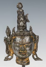 Tibetan Silvered and Gilt Bronze Head of Chakrasamvara, 15th C.