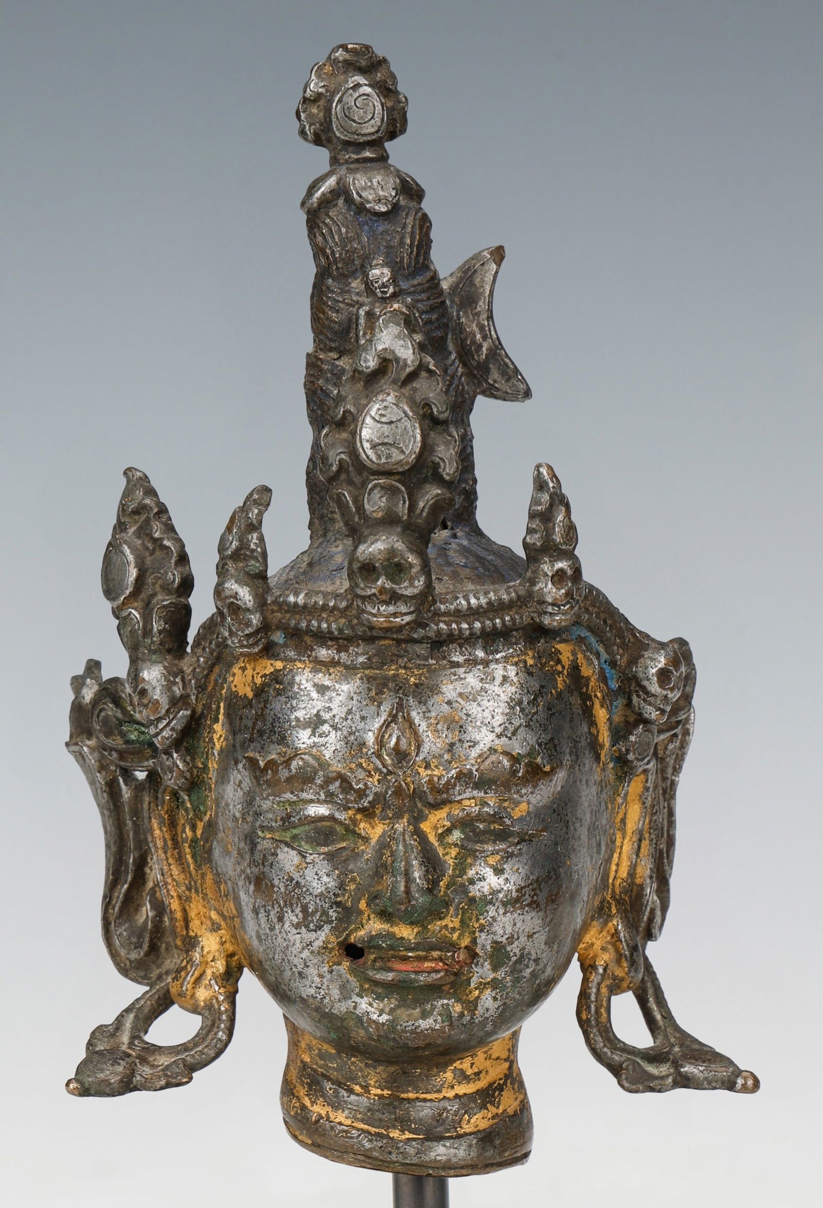 Tibetan Silvered and Gilt Bronze Head of Chakrasamvara, 15th C.