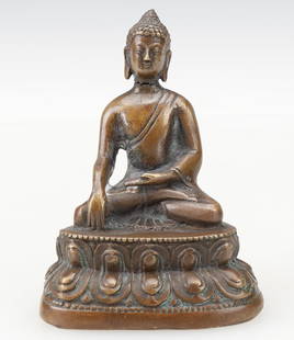 Tibetan Bronze Figure of Buddha: Tibetan Bronze Figure of Buddha. Size: 3.25'' x 2.5'' x 1.5'' (8 x 6 x 4 cm).