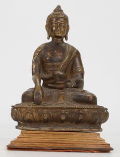 Southeast Asian Bronze Seated Buddha: Southeast Asian Bronze Seated Buddha. Size: 7.5'' x 5.5'' x 3.5'' (19 x 14 x 9 cm); Height on stand: 8.5" (22 cm).