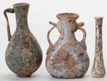 3 Ancient Roman Glass Unguent Vessels, 3.75" - 4": 3 Ancient Roman Glass Unguent Vessels. Heights: 3.75" (10 cm), 4" (10 cm) and 4.75" (12 cm).
