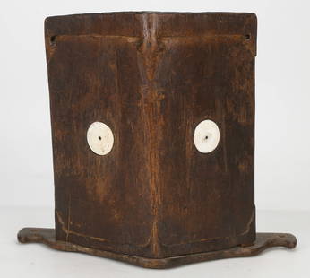 Dayak Conus Shell Adorned Wood baby Carrier: Dayak Conus Shell Adorned Wood baby Carrier. Size: 13'' x 15.5'' x 6'' (33 x 39 x 15 cm). From the Nina Sidley Collection of International Textiles and Folk Art.