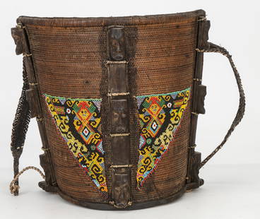 Dayak Rattan And Beaded Baby Carrier, Borneo: Dayak Rattan And Beaded Baby Carrier, Borneo.Size: 12.5'' x 13.5'' x 6.5'' (32 x 34 x 17 cm). From the Nina Sidley Collection of International Textiles and Folk Art.