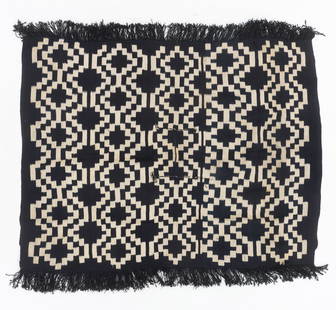 Mapuche Culture Poncho, Southern Patagonia, 20th C.: Mapuche Culture Poncho, Southern Patagonia, 20th C.Chieftain’s wool poncho with traditional indigo ikat derived design worn in festival and ceremonial events. Has the odd character of an offset