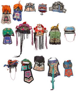 Group of 15 Chinese Silk Children's Hats, Early 20th C.: Group of 15 Chinese Silk Children's Hats, Early 20th C. Silk embroidery, metal embellishments, silk, cotton. Sizes Ranging From: 5'' x 6'' x 6'' (13 x 15 x 15 cm); To: 11'' x 7'' x 7'' (28 x 18 x 18