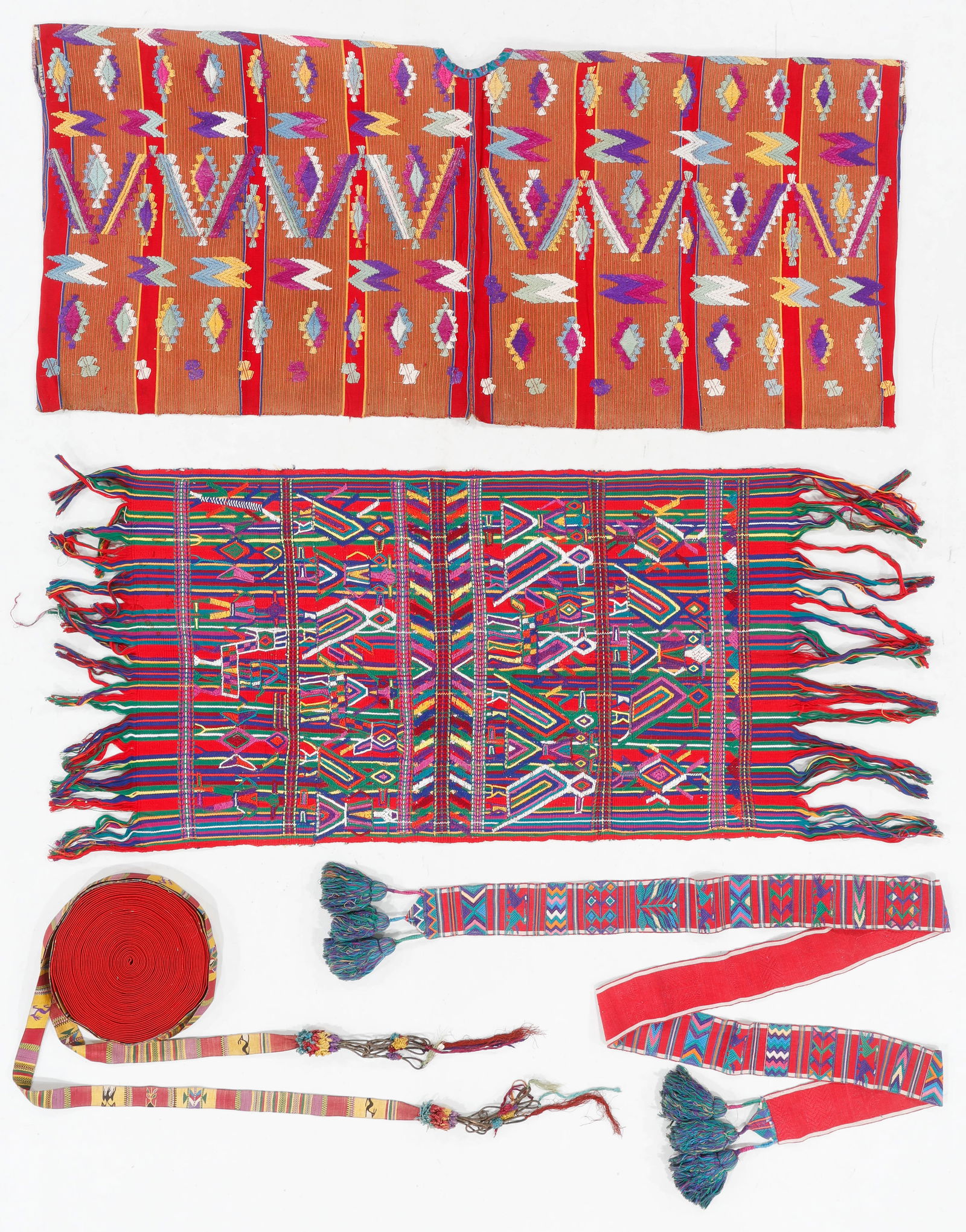 Four Guatemalan Woven Textiles, including Nebaj, c. 1930-1970: Four Guatemalan Woven Textiles, including Nebaj, c. 1930-1970. Cotton. A very fine woman’s ceremonial huipil woven on natural brown cotton warps together with her hair tie and a Tzute from Nebaj tog