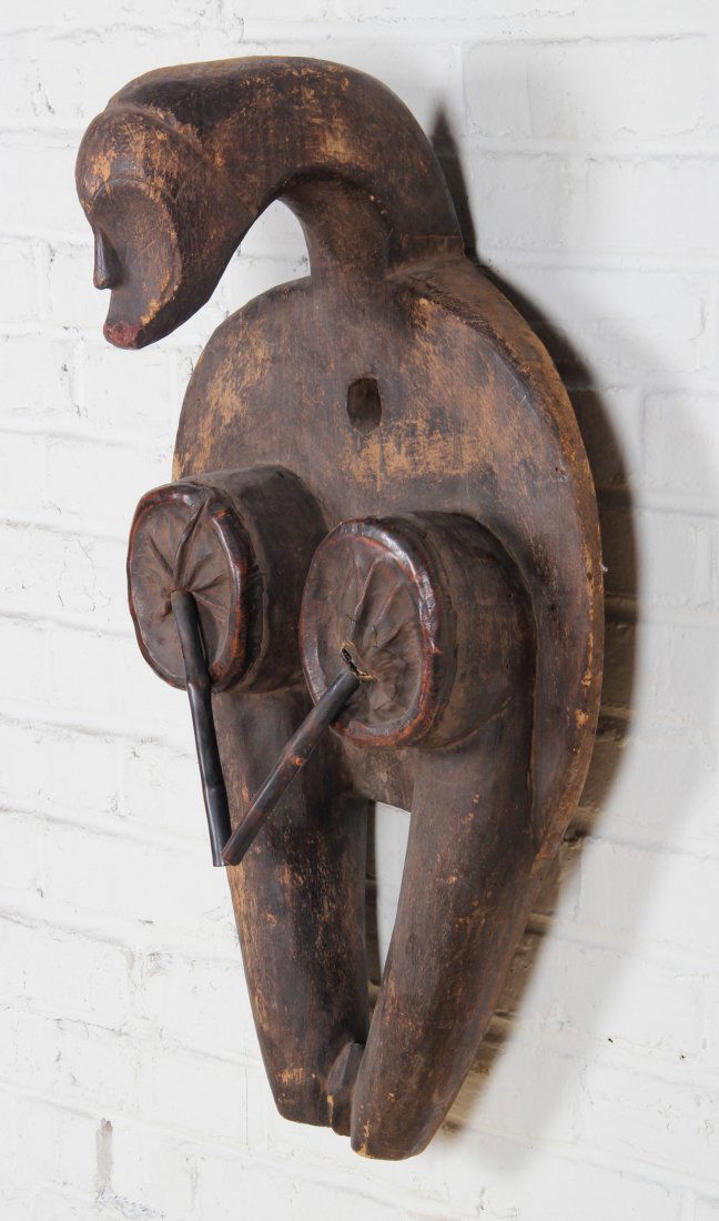 Carved African Bellows Sculpture: Carved African Bellows Sculpture, early 20th c, female form, carved wood, leather. Size: 29.5 x 17 x 11 inches. Provenance: estate of William Murray, Philadelphia.