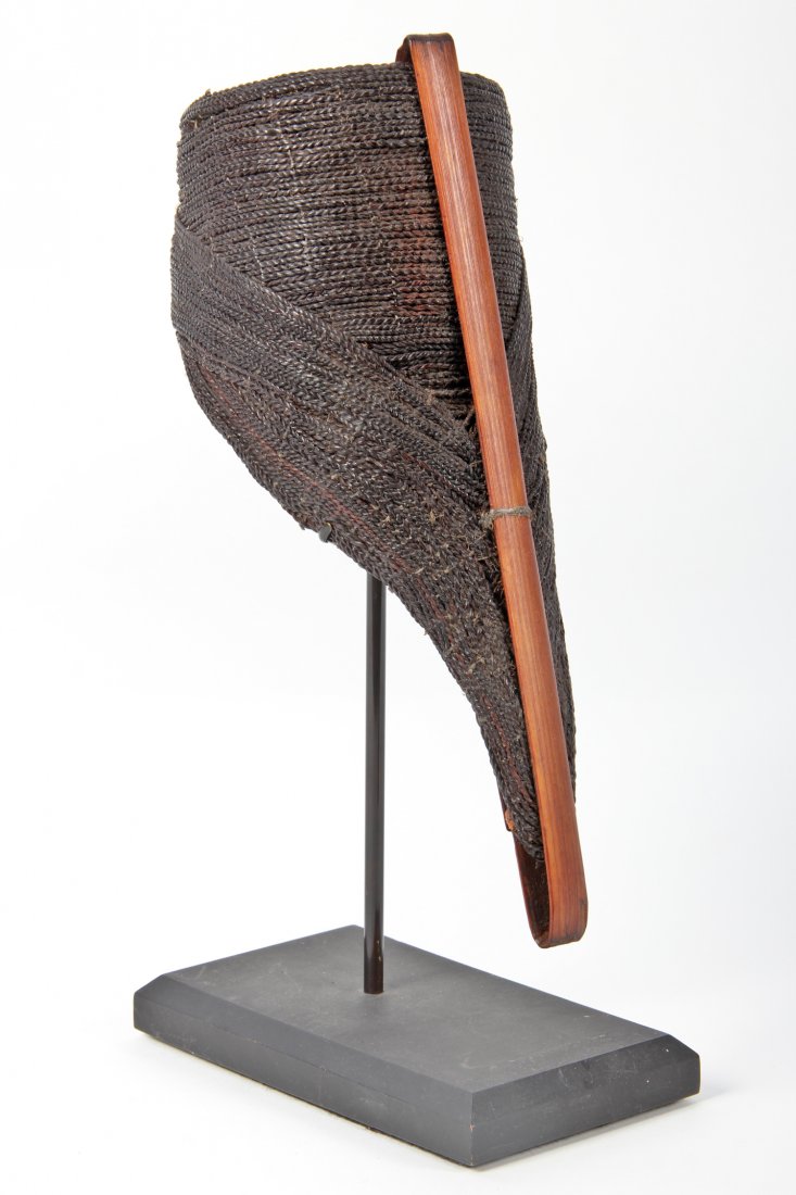 Tribal Armband, Papua New Guinea: Tribal Armband, Papua New Guinea, with stand. Size: 10.5" x 4" x 4" (armband). Provenance: Jane Steinsnyder.