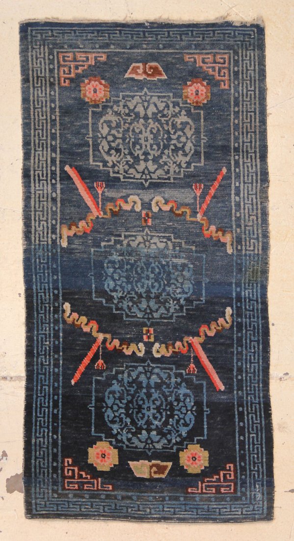Tibetan Three Medallion Khaden Rug: 2'7" x 5'4" (74 x 1: Tibetan Three Medallion Khaden Rug, circa 1900. Size: 2'7" x 5'4" (74 x 162 cm). Provenance: Gary McKinnis.