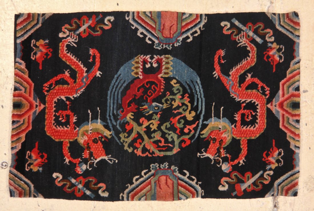 Tibetan Dragon Rug: 1'10" x 2'9" (55 x 83 cm): Tibetan Dragon Rug. Size: 1'10" x 2'9" (55 x 83 cm). Provenance: Gary McKinnis.