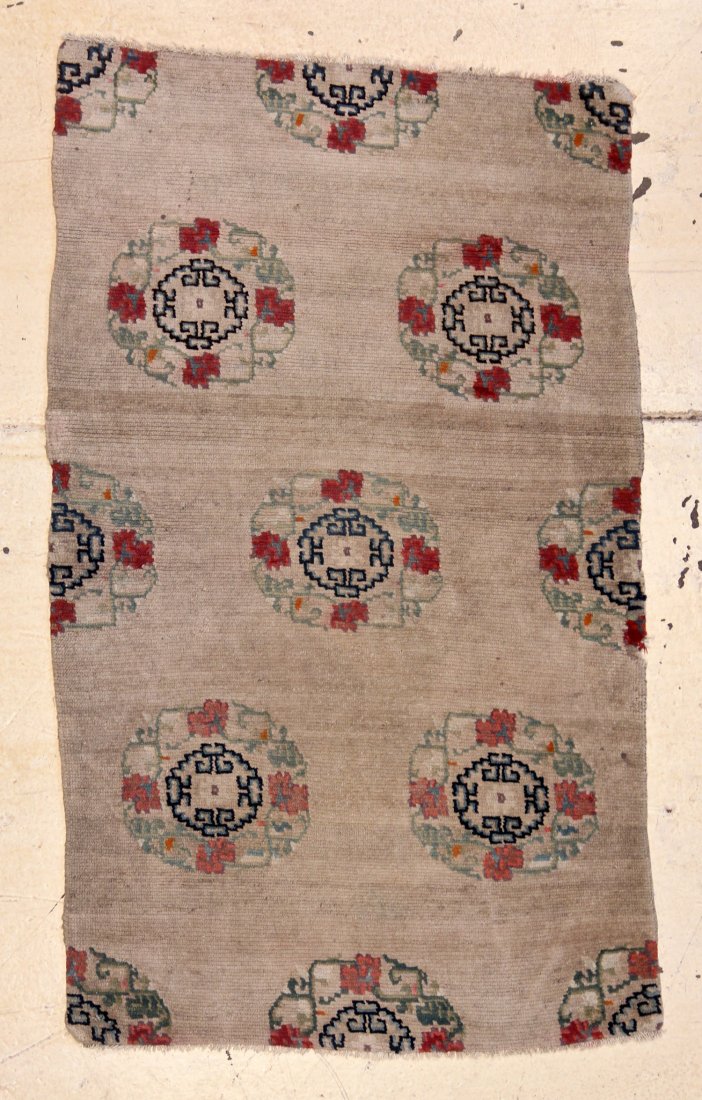 Ivory Ground Tibetan Rug: 2'8" x 4'5" (81 x 134 cm): Ivory Ground Tibetan Rug, circa 1900. Size: 2'8" x 4'5" (81 x 134 cm). Provenance: Gary McKinnis.