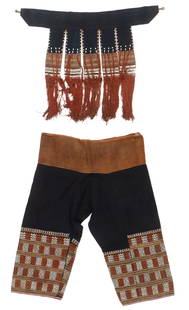 Yao Embroidered Pants and Apron/Skirt (2), Early 20th C.: Yao Embroidered Pants and Apron/Skirt (2), Early 20th C.. Indigo-dyed cotton with embroidery. Seed beads and tassels on apron skirt panels. 1'8'' x 2'7'' (51 x 79 cm); 2'3'' x 1'11'' (69 x 58 cm). Pro